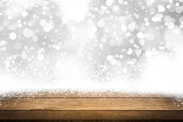 istock empty wooden on white blurred nature backdrop. Wood table top. can used for display or montage your products 974630462