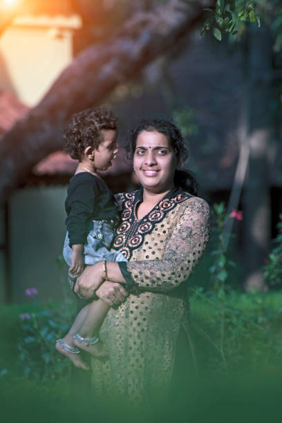istock mother and daughter in forest 974634034