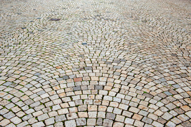 istock Abstract background of rectangular paving stones in a semicircle. 974634250