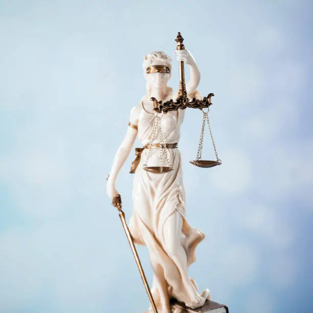 Photo of Goddess of justice on a light background