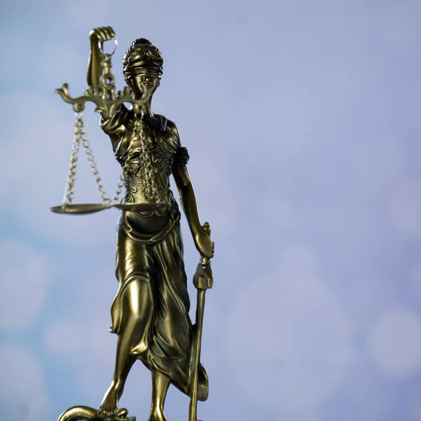 istock Goddess of justice on a light background 974637036
