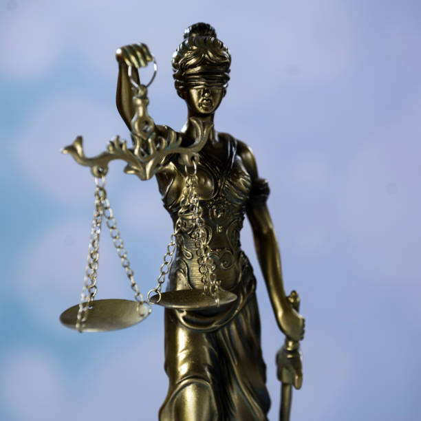 istock Goddess of justice on a light background 974637054