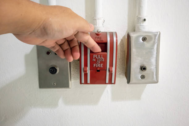 istock push in pull down switch in case of fire and emergency door release switch against concrete background 974637642