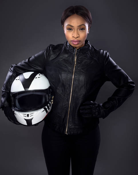 istock Black Female Biker Wearing Leather 974643388