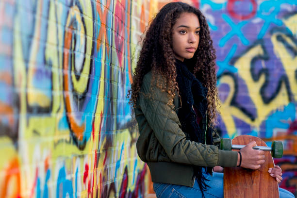 istock Girl Posing With Skateboard 974646904