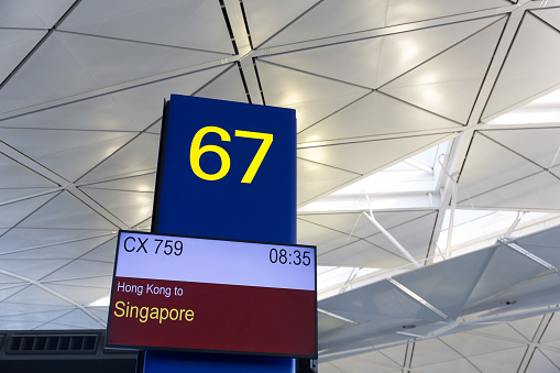 Hong Kong, Hong Kong - May 24, 2018 : Boarding Gate at the Hong Kong International Airport. The flight is going to Singapore Changi Airport.