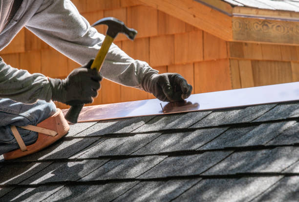 istock Installing new roof with hammer 974651242