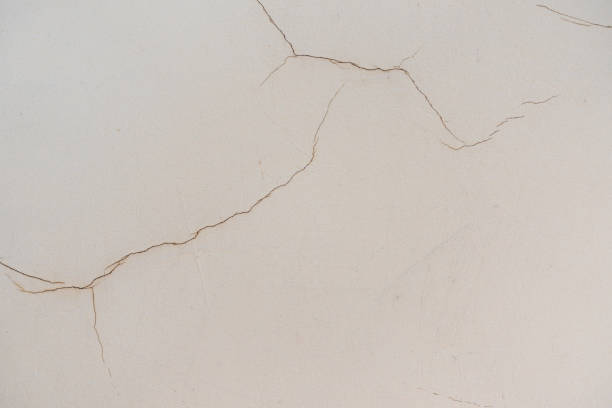 istock Old Cracked Weathered Shabby Plastered Peeled Wall Background. 974657802