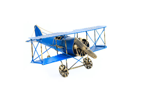 istock Blue metal hand made toy plane 974663224