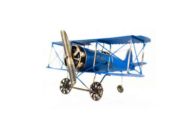 istock Blue metal hand made toy plane 974663234
