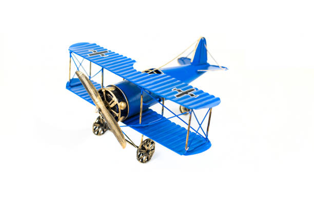 istock Blue metal hand made toy plane 974663248