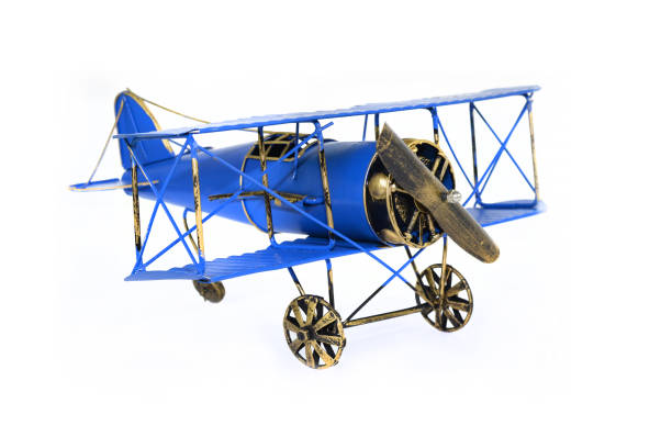 istock Blue metal hand made toy plane 974663310