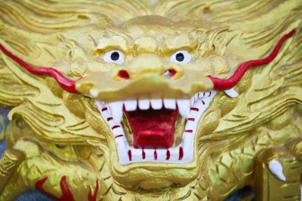 istock Chinese Temple Dragon Sculpture Closeup 974663424