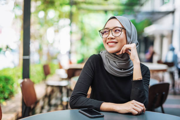 istock Malaysian woman in the cafe 974663518