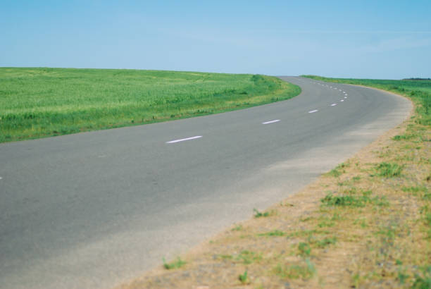 istock The road goes beyond the horizon, 974670356