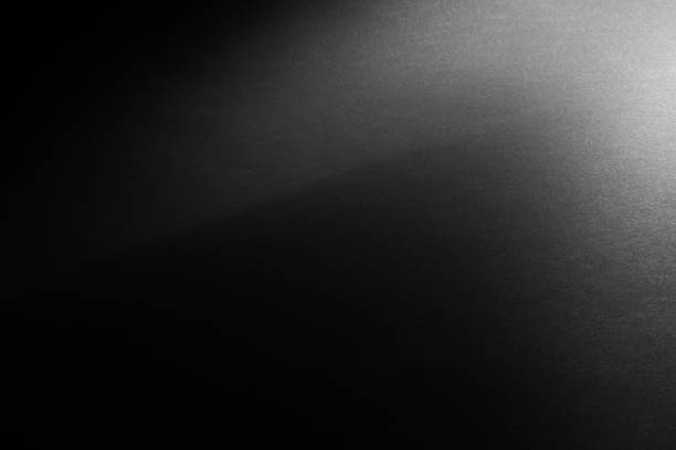istock black paper texture or background with spotlight, dark wall backdrop wallpaper, dark tone. 974671120