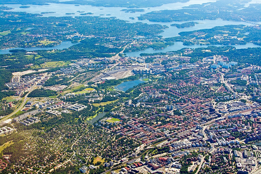 STOCKHOLM, SWEDEN - JUNE 1, 2018: Aerial shot over Solna Sundbyberg Stockholm during inflight to Arlanda airport on a sunny day on June 1, 20108 in Stockholm, Sweden.
