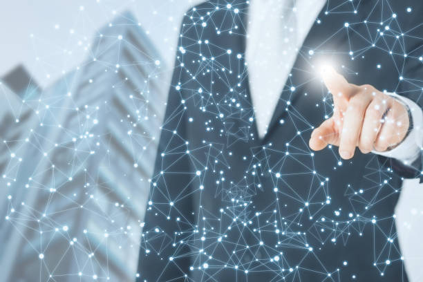 istock Businessman on blurred skybuilding background using flying network connection 974675870