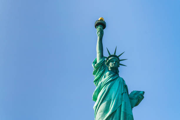 istock The statue of Liberty  with blue sky background. 974676774