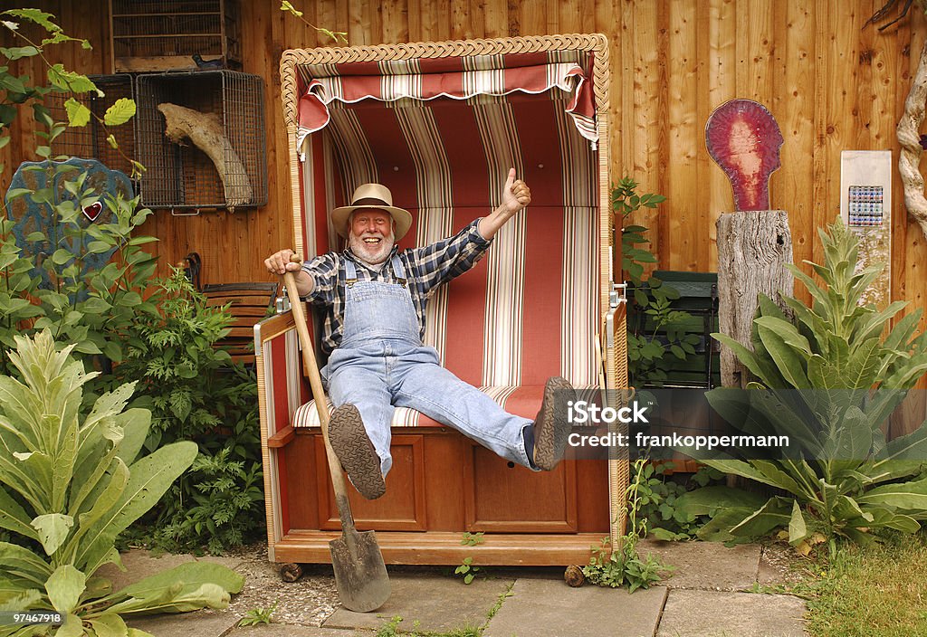 In the garden  Hooded Beach Chair Stock Photo