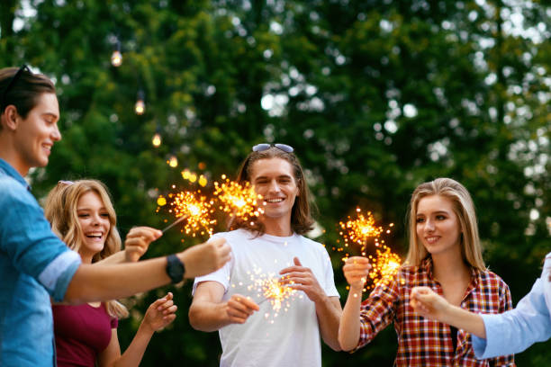 istock Happy Friends Having Fun Outdoors, People Enjoying Party 974679508