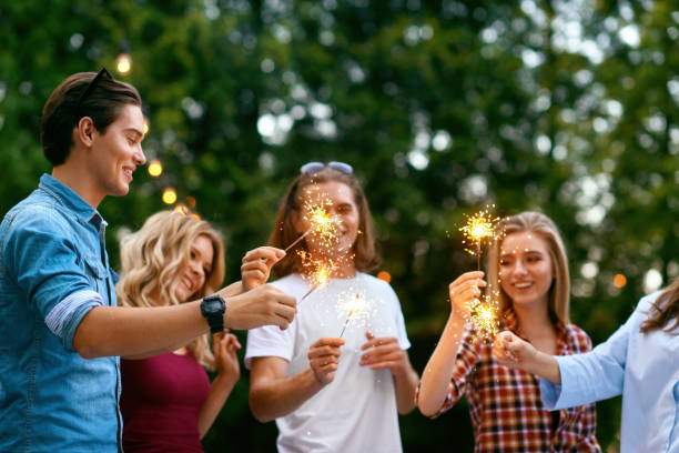istock Happy Friends Having Fun Outdoors, People Enjoying Party 974679538
