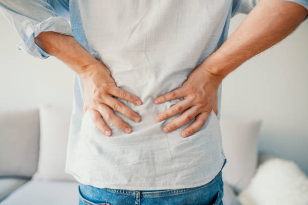 istock Acute pain in a male lower back 974684836