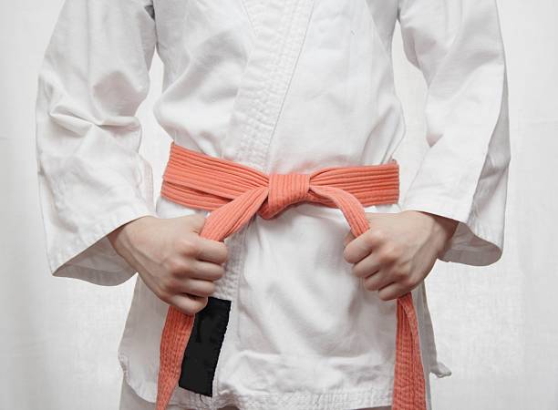 istock White kimono and an orange belt. 97468795