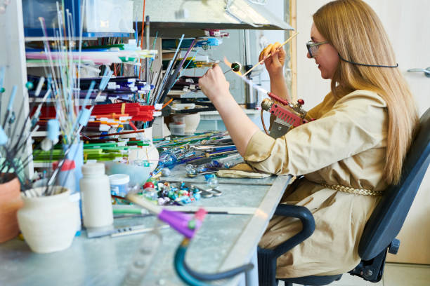 istock Female Artist in Lampwork Studio 974688018