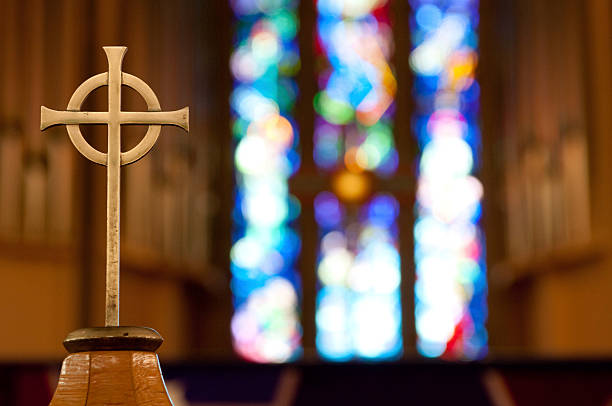 Cross on Church Alter  stained glass photos stock pictures, royalty-free photos & images