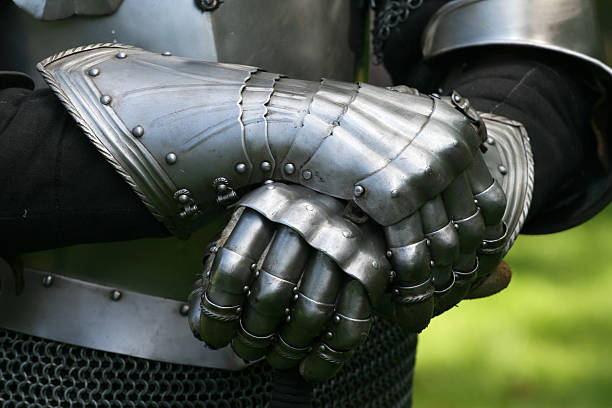 gloves of a knight - uitbeenhandschoen stockfoto's en -beelden
