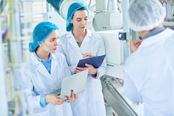 istock Female Trainees at Modern Plant 974695344