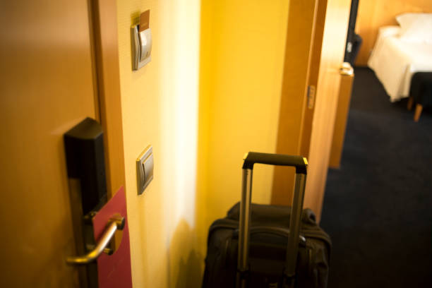 istock Luxury modern style hotel suite bedroom clean and ready for guests. 974698380