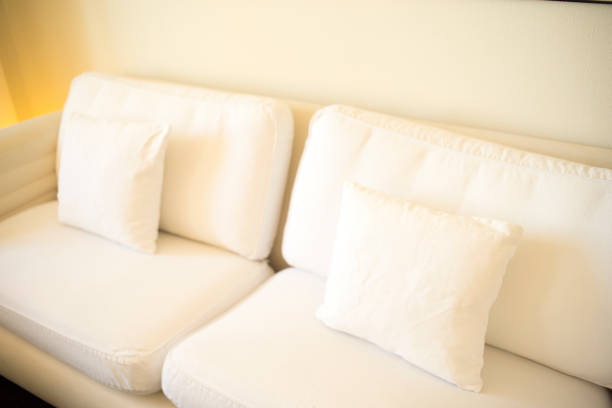 istock Luxury modern style hotel suite bedroom clean and ready for guests. 974698578
