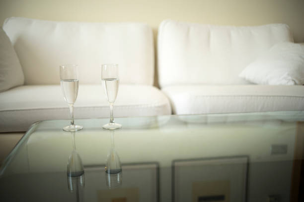 istock Luxury modern style hotel suite bedroom clean and ready for guests. 974698730