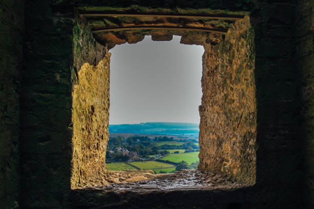 istock View to countryside through castle wall window 974699058