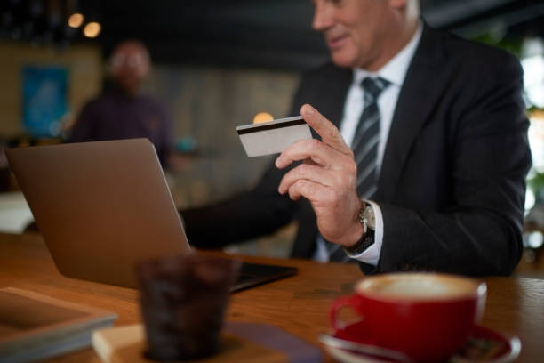 istock Businessman in coffee shop 974699096