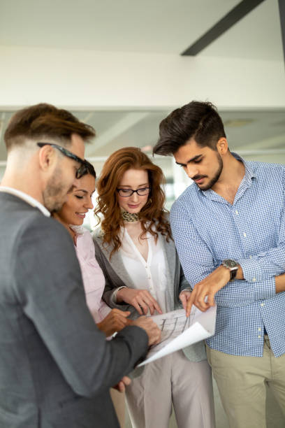 istock Creative business people working on business project in office 974701514