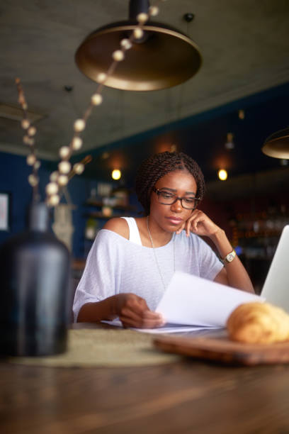 istock Woman with papers 974701668