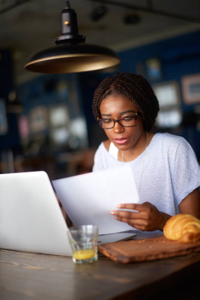 istock Woman with papers 974701740