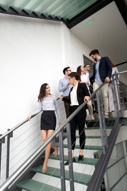 istock Business people having fun in office 974701864