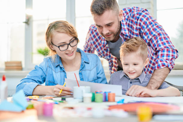 istock Loving Family Expressing Creativity 974702462