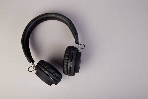 istock Black Headphones. Flatl lay 974705454