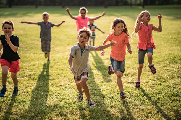 istock Kids are happy in nature 974705668