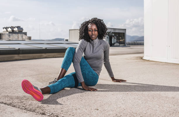 istock Young Woman Exercising Outdoors 974705872