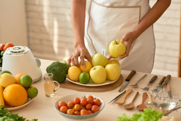 istock Preparing Fresh Garden Salad 974718828