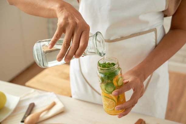 Preparing Citrus and Mint Infused Water