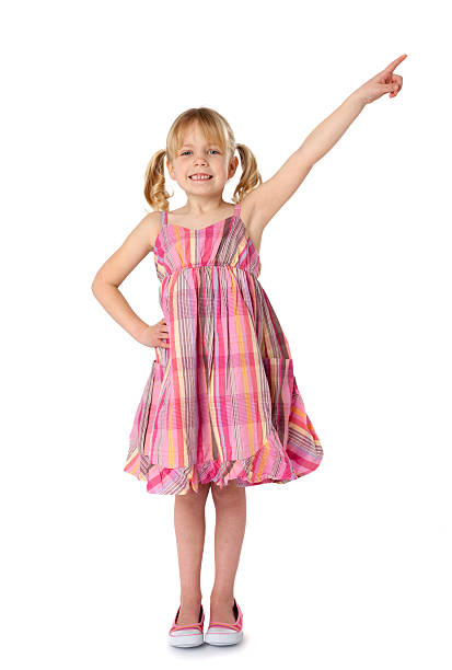 Female Child Pointing Upward stock photo