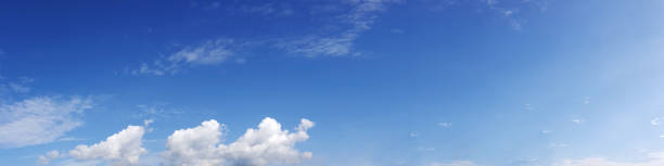 istock Vibrant color panoramic sky with cloud on a sunny day. 974719164