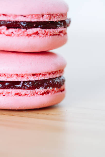 istock French cookies macaroons with strawberry 974728414